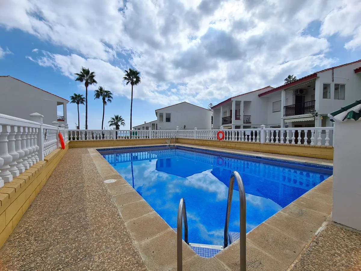 Beachside 2-Bedroom Apartment with Garden & Sea Views