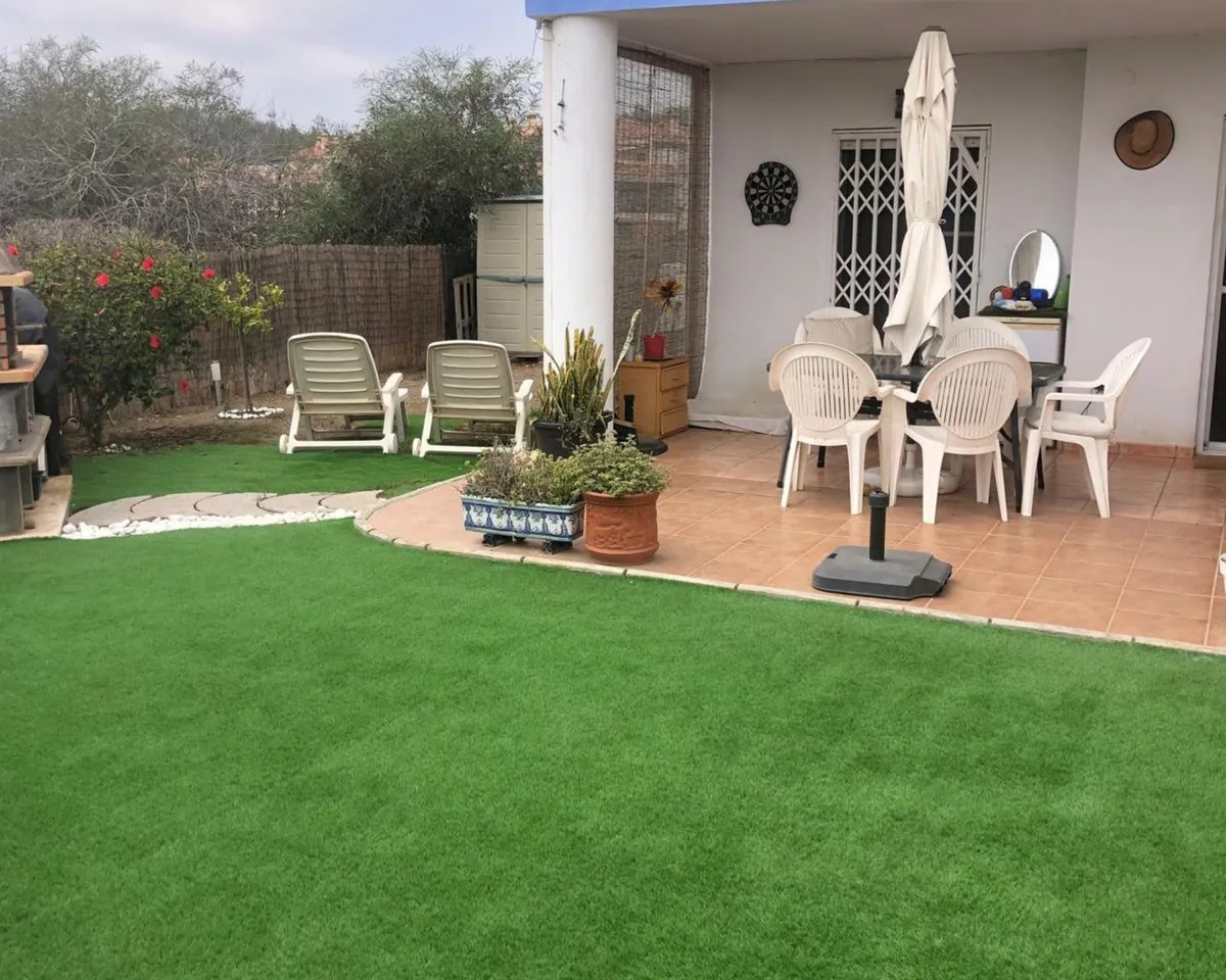 Coastal Garden Oasis: El Faro Ground Floor Apartment