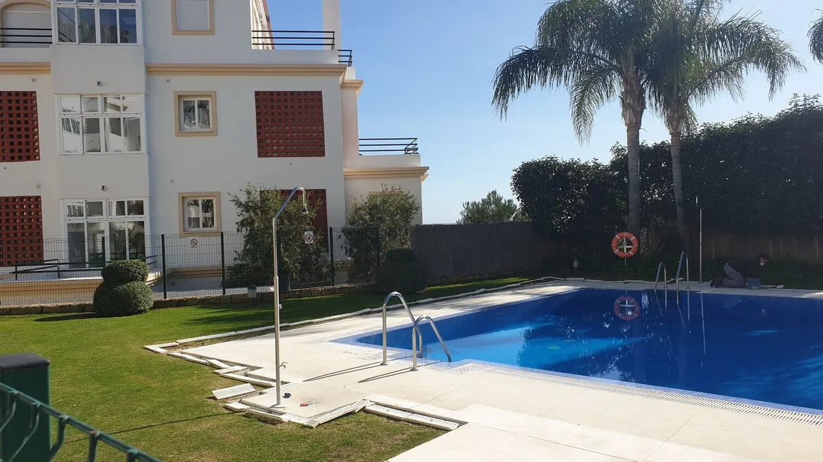 Coastal Retreat: Ground-Floor Apartment with Private Garden