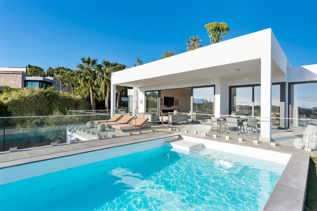 Luxurious Villa in Gated El Herrojo with Panoramic Sea Views